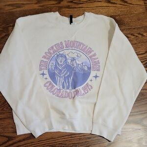 Divided White Crewneck Sweatshirt with Purple Wolf Graphic